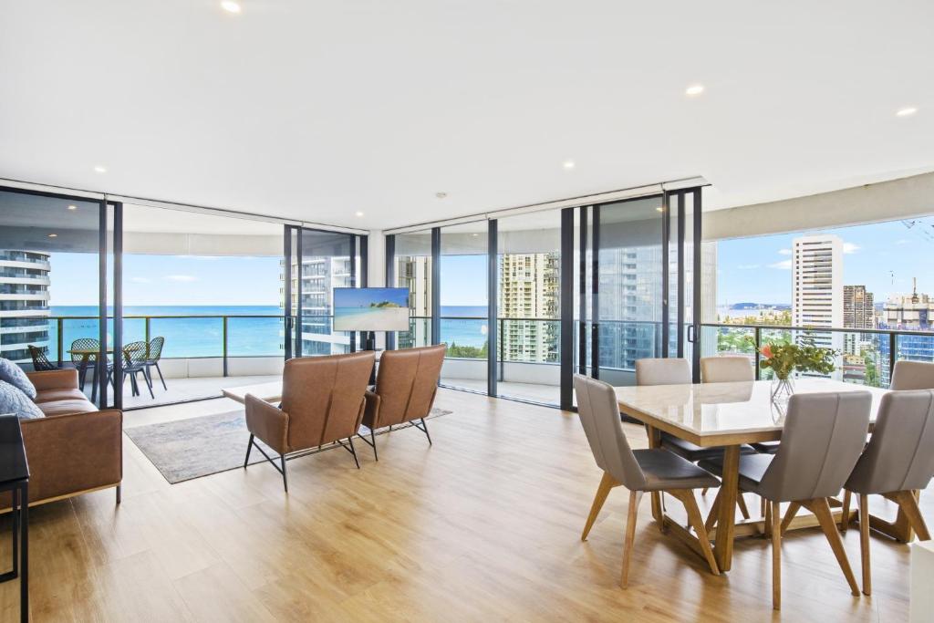 a dining room with a view of the ocean at Oracle 2 1907 in Gold Coast
