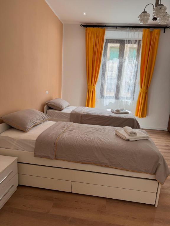 Postel nebo postele na pokoji v ubytování GALiLEO PiSA