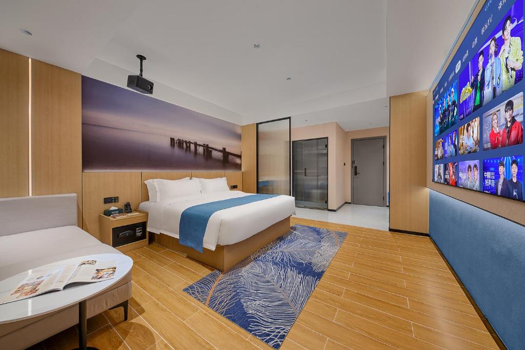 Postel nebo postele na pokoji v ubytování Pearl Hotel - Gongbei Port Zhuhai