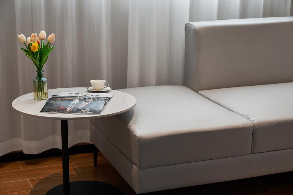 Postel nebo postele na pokoji v ubytování Pearl Hotel - Gongbei Port Zhuhai
