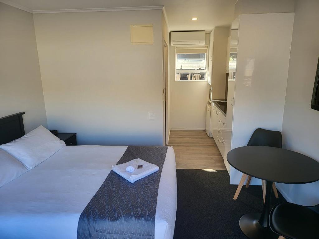 Postel nebo postele na pokoji v ubytování Ferrylink Motel