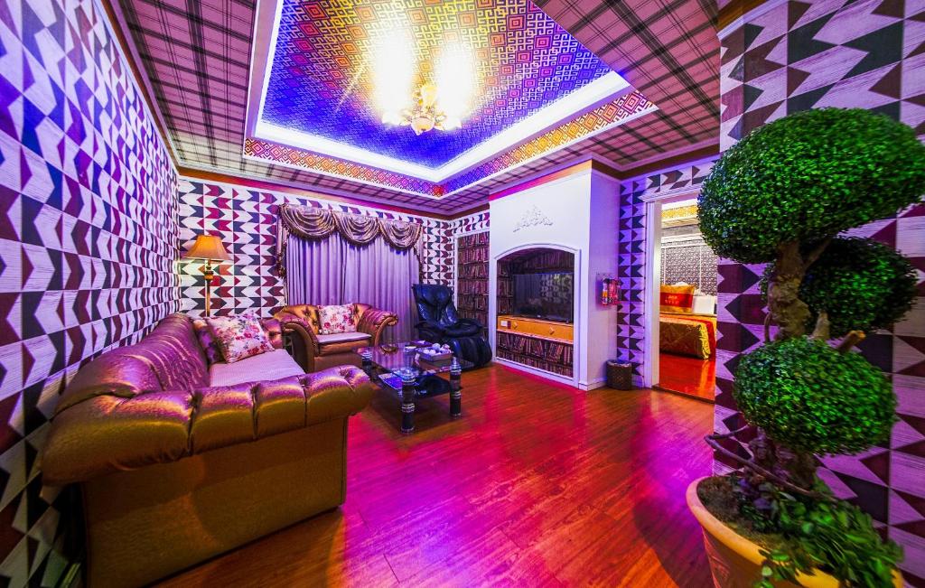 Posezení v ubytování Wen Sha Bao Motel-Xinying
