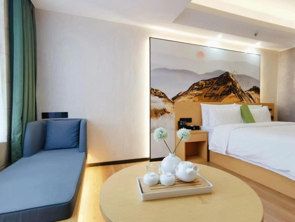 Postel nebo postele na pokoji v ubytování Connar Hotel - Shenzhen Shawei