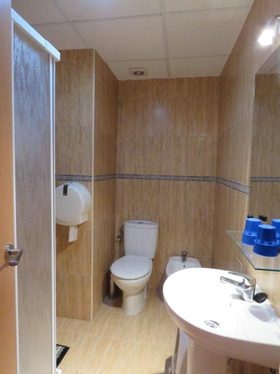 Koupelna v ubytování Hotel Alain