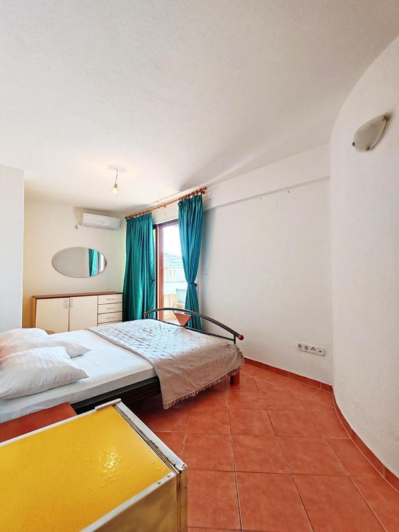 Postel nebo postele na pokoji v ubytování Apartments & Rooms Verse