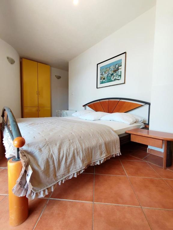 Postel nebo postele na pokoji v ubytování Apartments & Rooms Verse