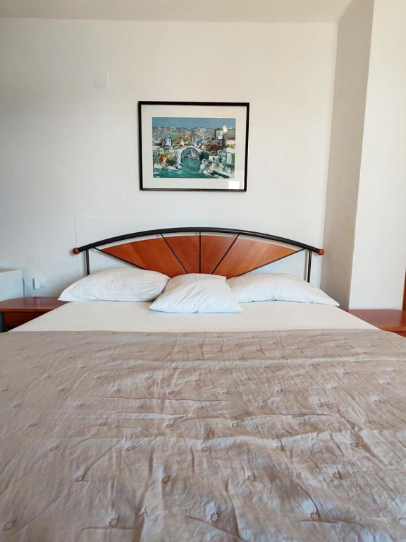 Postel nebo postele na pokoji v ubytování Apartments & Rooms Verse
