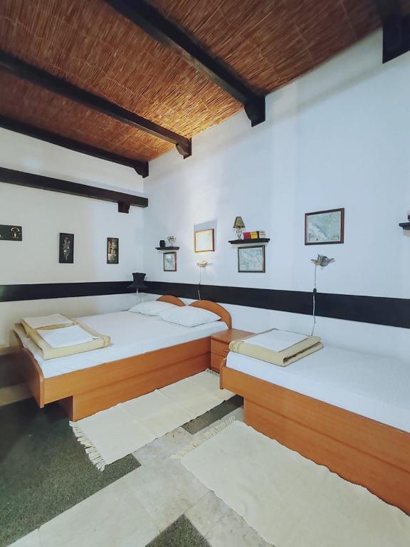 Postel nebo postele na pokoji v ubytování Apartments & Rooms Verse