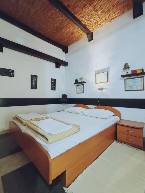 Postel nebo postele na pokoji v ubytování Apartments & Rooms Verse