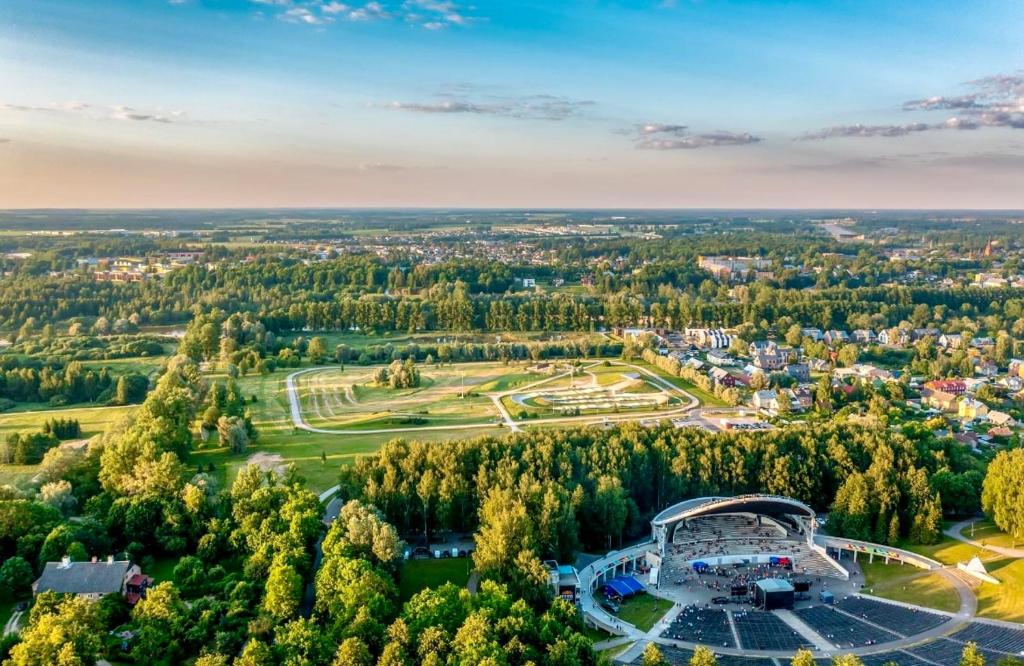 an aerial view of a park with a stadium at Green Side Apartment in Tartu