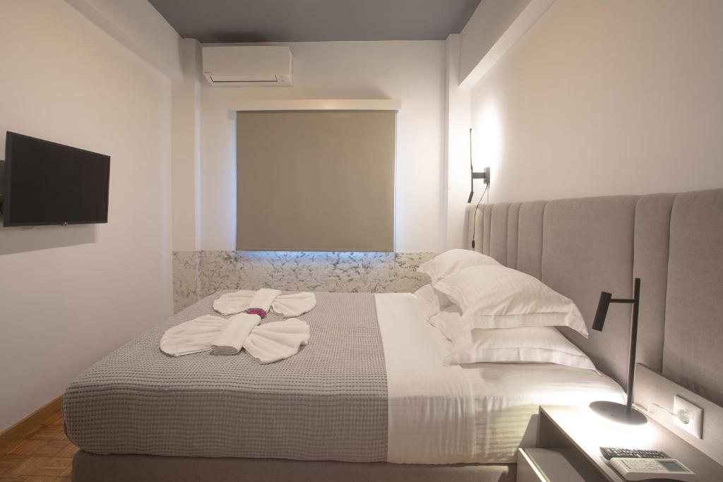 Posteľ alebo postele v izbe v ubytovaní Aonia Luxurious Modern Boutique Apartments