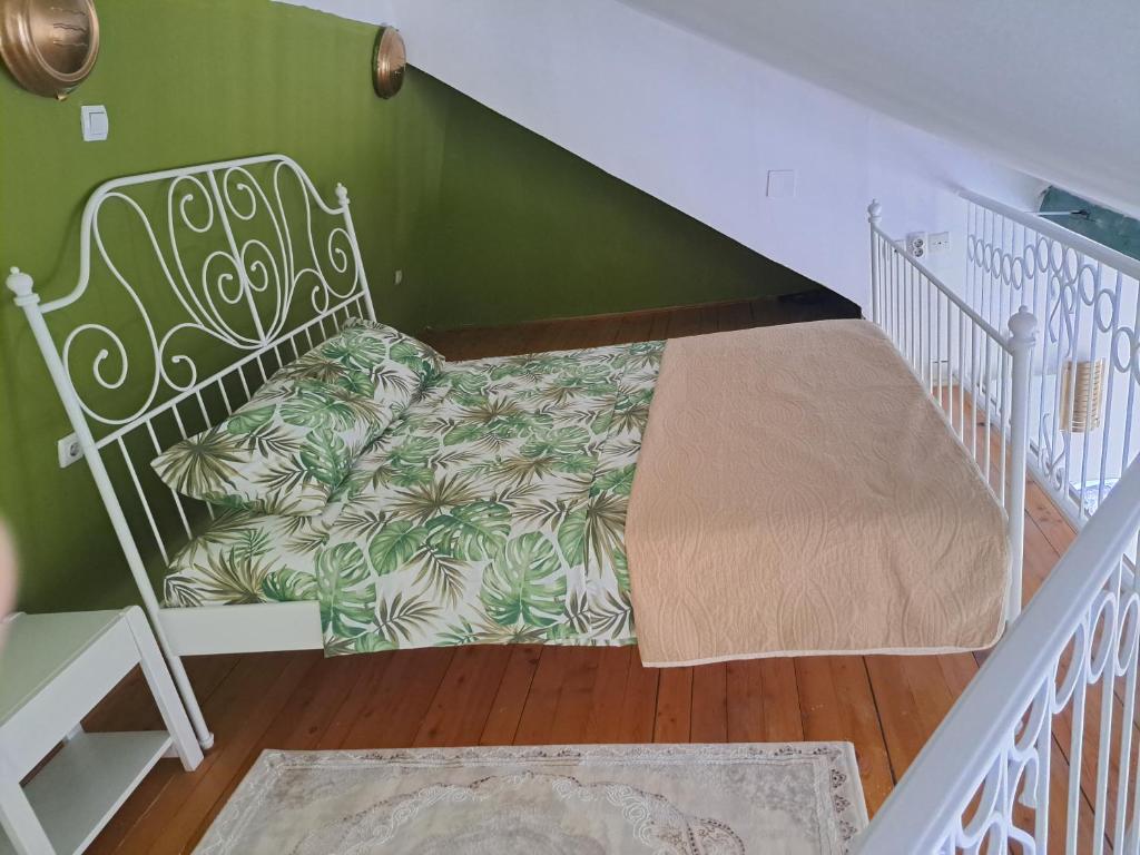 Postel nebo postele na pokoji v ubytování Gallery apartment