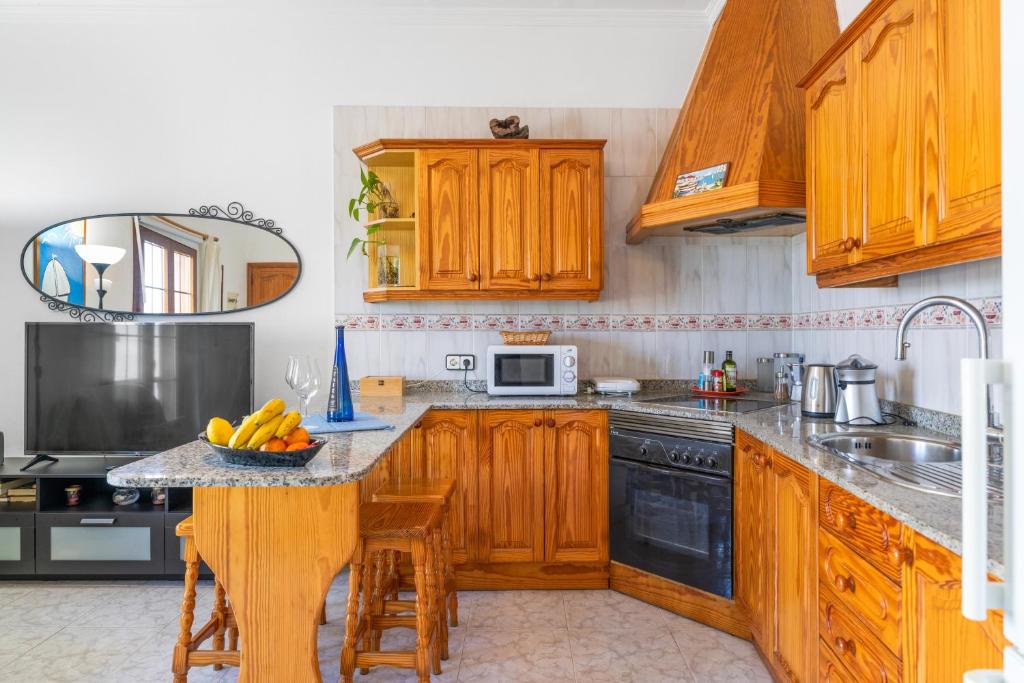 Kuchyň nebo kuchyňský kout v ubytování Casita Isabella