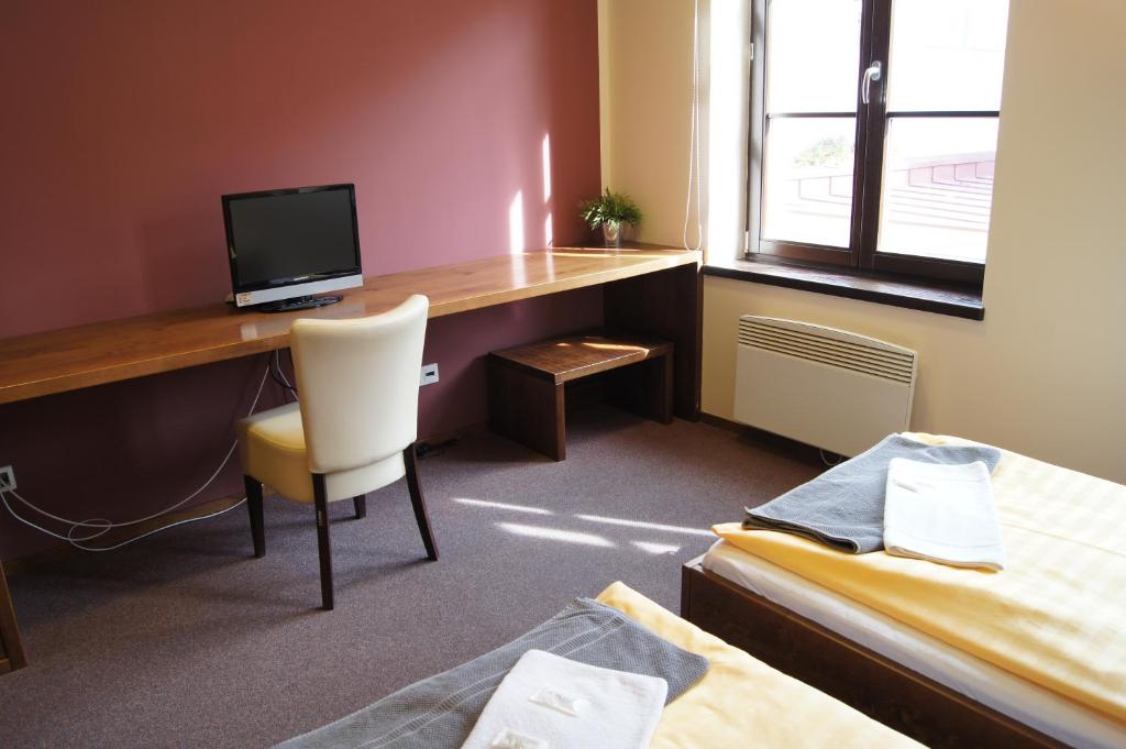 Telewizja i/lub zestaw kina domowego w obiekcie Pension Inspirace a Wellness self check-in