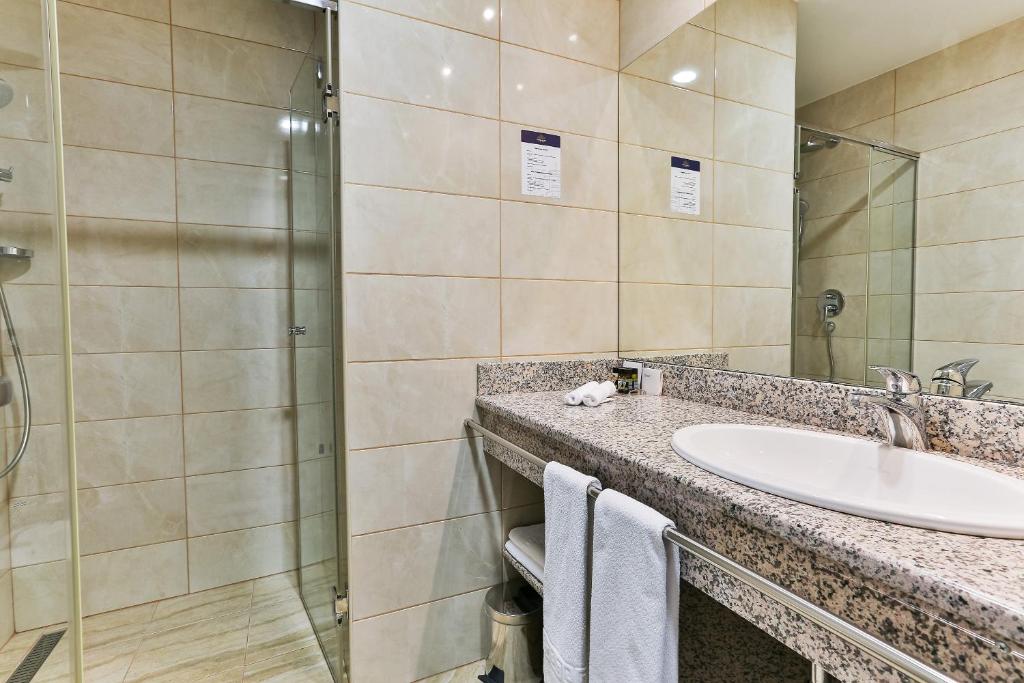 Koupelna v ubytování Kings Park Hotel
