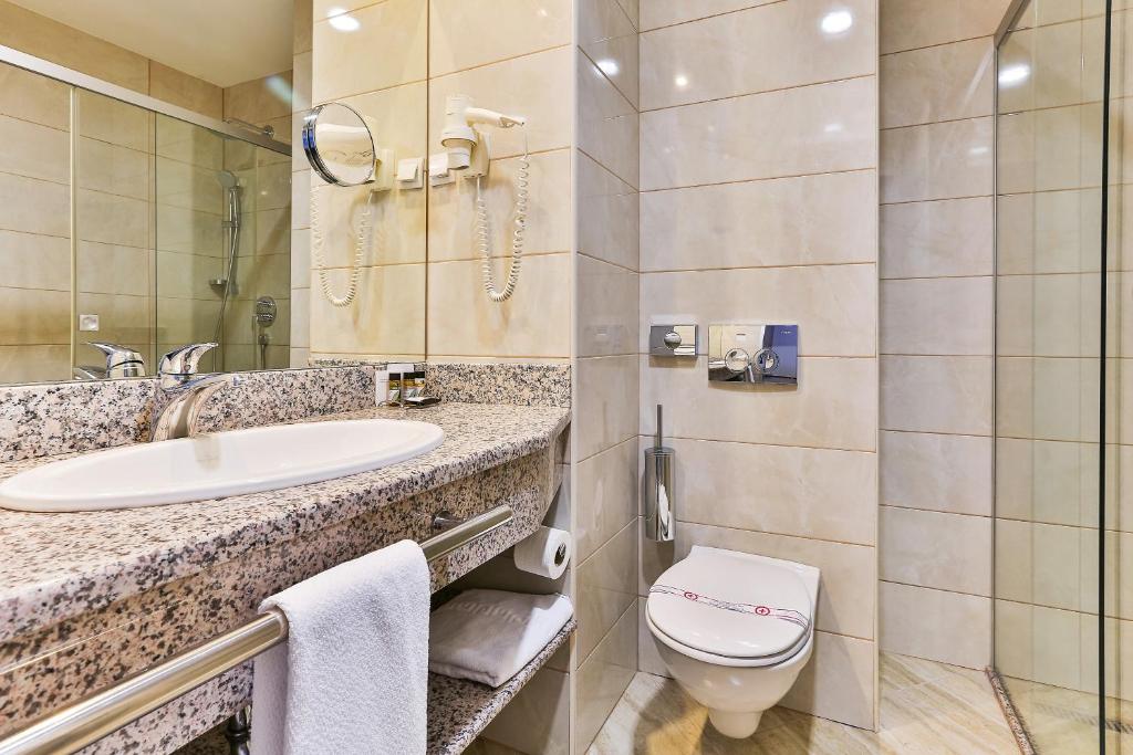 Koupelna v ubytování Kings Park Hotel