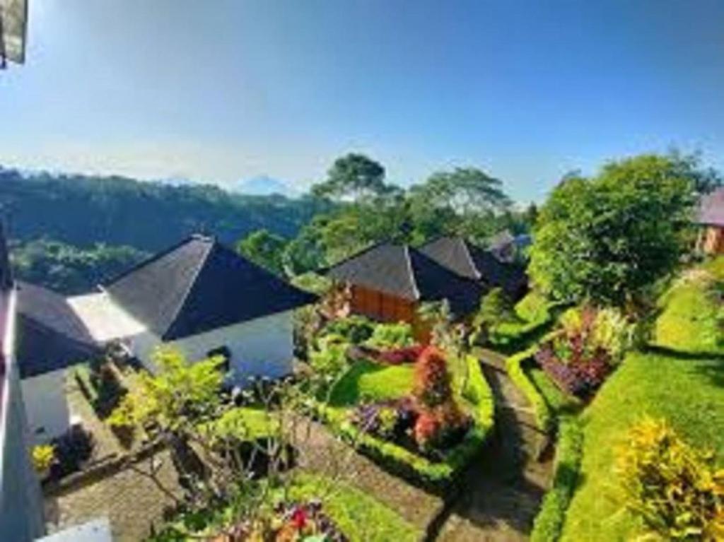 an aerial view of a house with a garden at The Green Ponci Bedugul in Baturiti