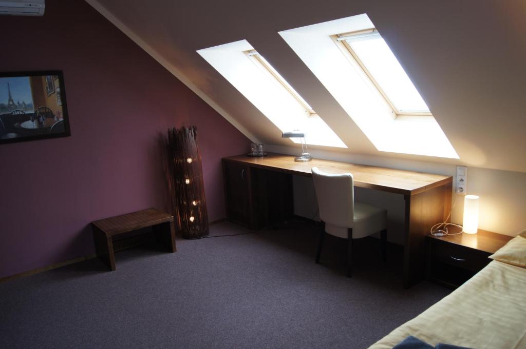 Telewizja i/lub zestaw kina domowego w obiekcie Pension Inspirace a Wellness self check-in