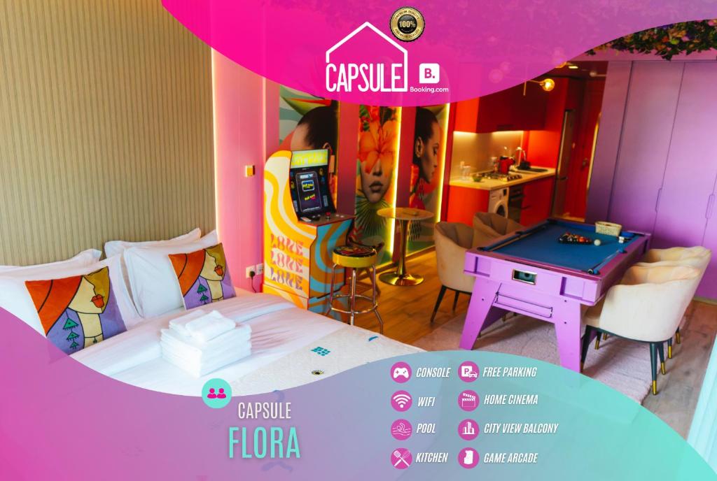 a room with a bed and a pool table in it at Capsule Flora business bay view Burj Khalifa-pool table-game arcade-Projector-Playstation 5 in Dubai
