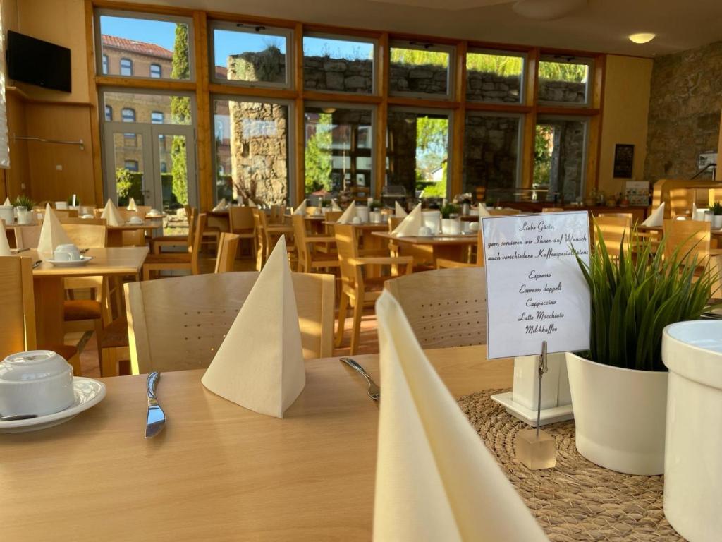 Restoran või mõni muu söögikoht majutusasutuses Hotel Weidenmühle