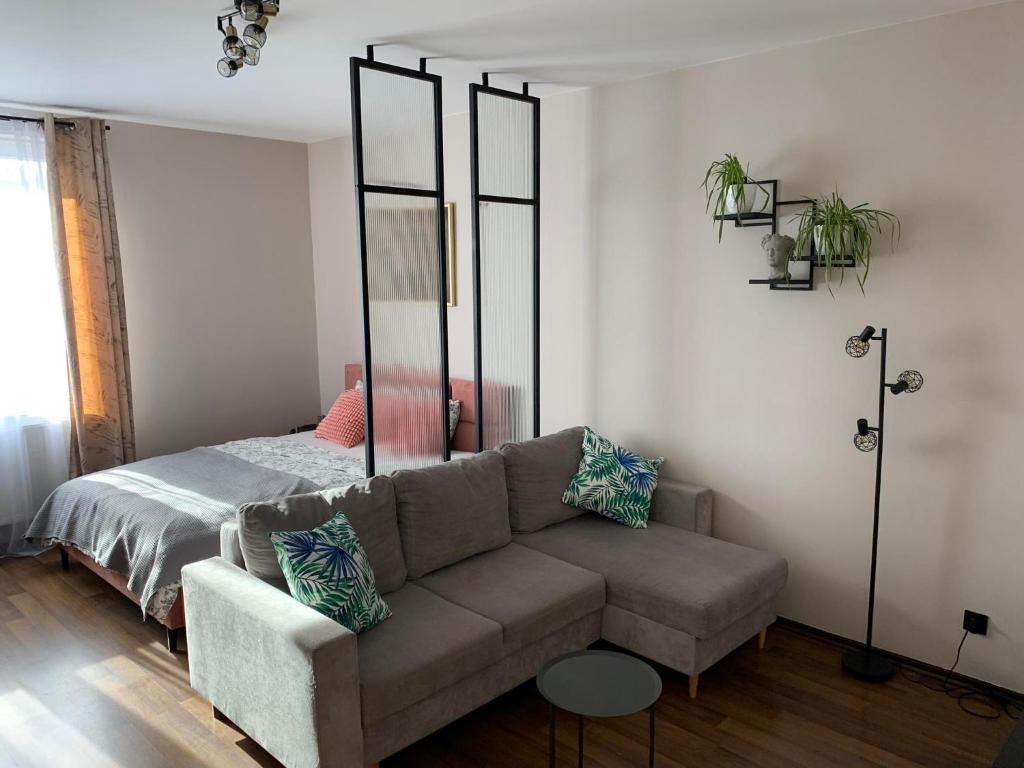 Posteľ alebo postele v izbe v ubytovaní Kotlarska Apartments