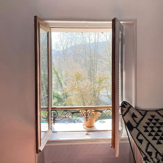 Postel nebo postele na pokoji v ubytování Cassiopée - appartement lumineux avec belle vue