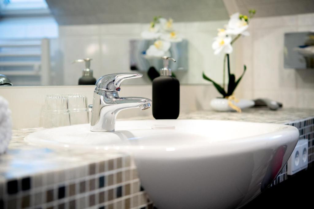 Koupelna v ubytování Hotel Busch