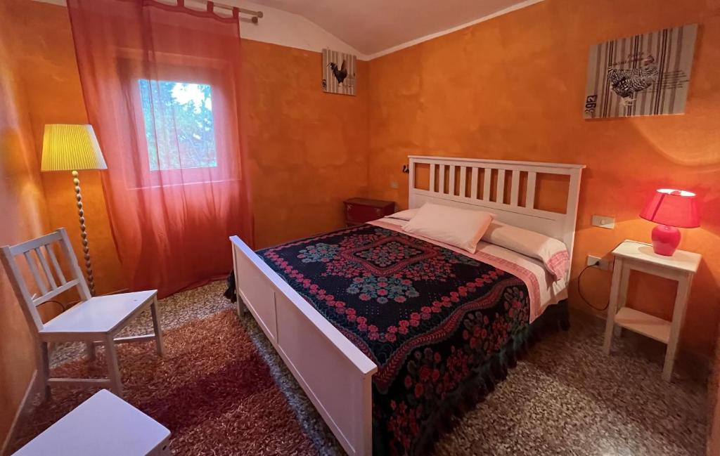 Postel nebo postele na pokoji v ubytování Podere VignaLago