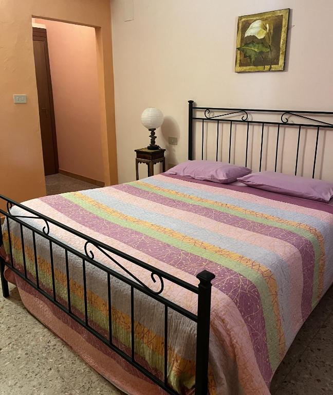 Postel nebo postele na pokoji v ubytování Podere VignaLago