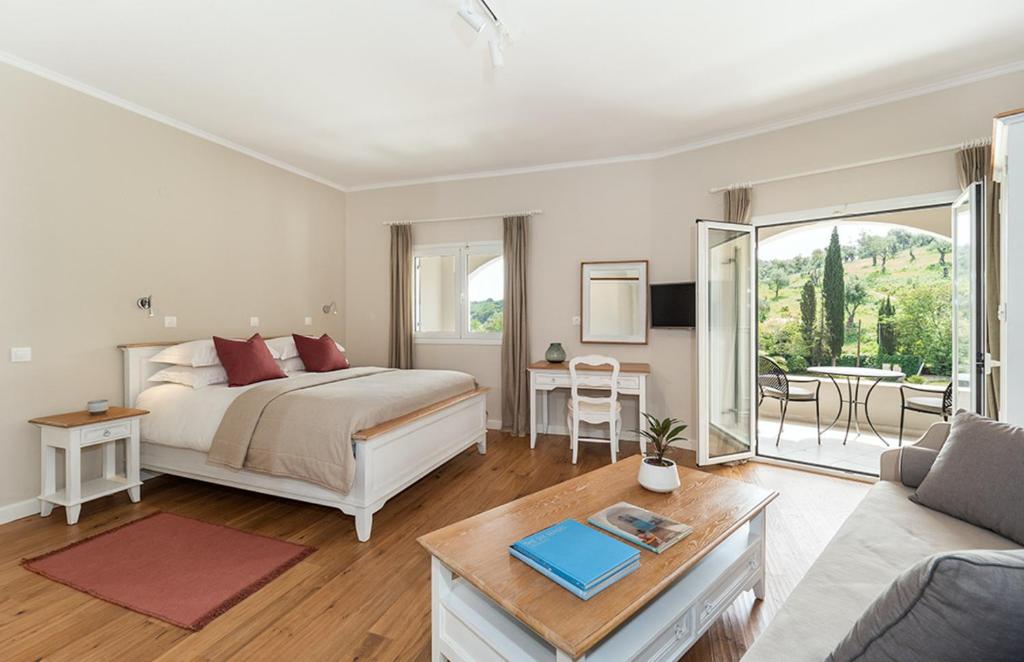 Postel nebo postele na pokoji v ubytování Bella Mare Hotel