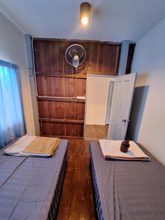 Postel nebo postele na pokoji v ubytování Stay with me in Pai