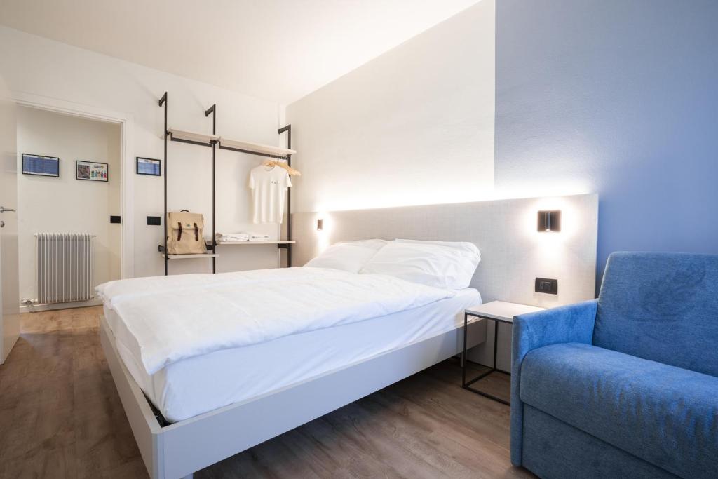 Łóżko lub łóżka w pokoju w obiekcie Villa Stanga - Gardaslowemotion