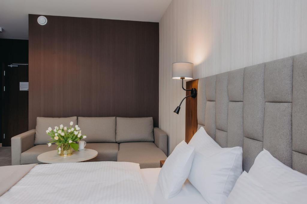 Postel nebo postele na pokoji v ubytování Elements Apartments