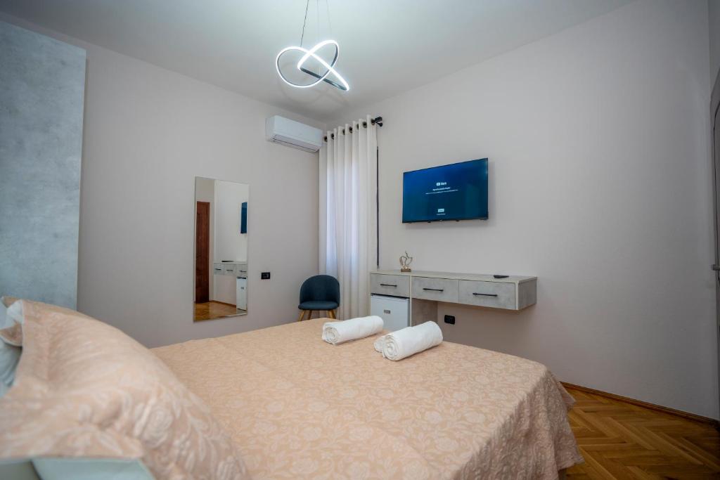 Postel nebo postele na pokoji v ubytování Hotel Pepe