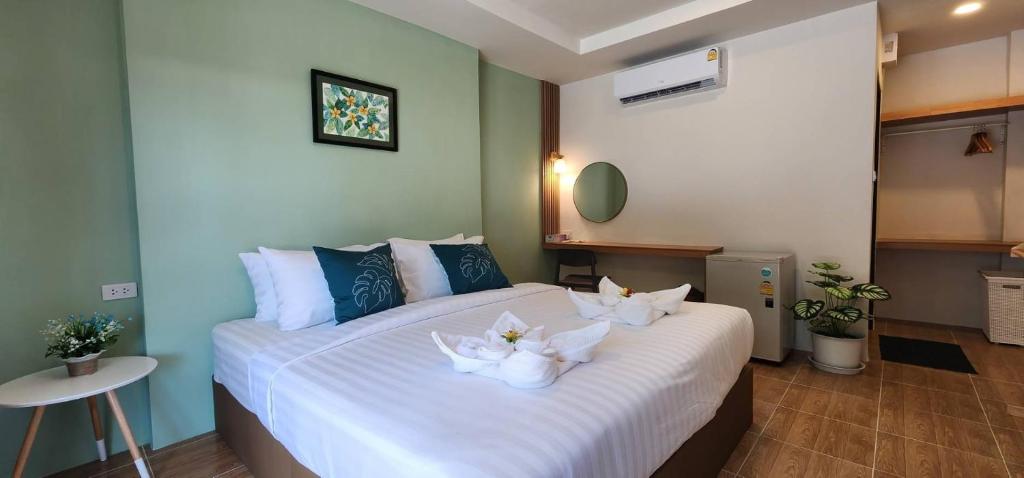 Postel nebo postele na pokoji v ubytování Samet Lucky Resort