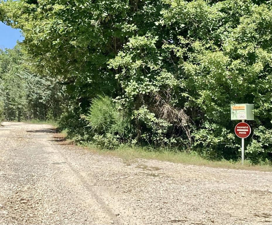 a do not enter sign on the side of a road at La Grisonne - Chalet 3 in Revest-du-Bion