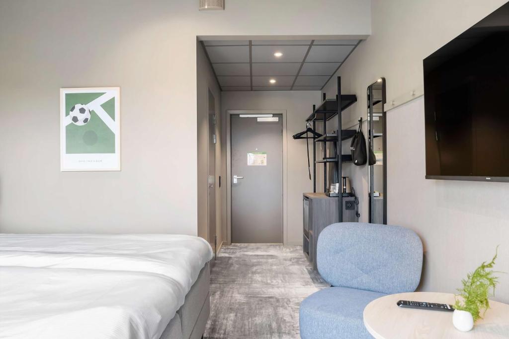 Postel nebo postele na pokoji v ubytování Aiden by Best Western Karlstad Arena