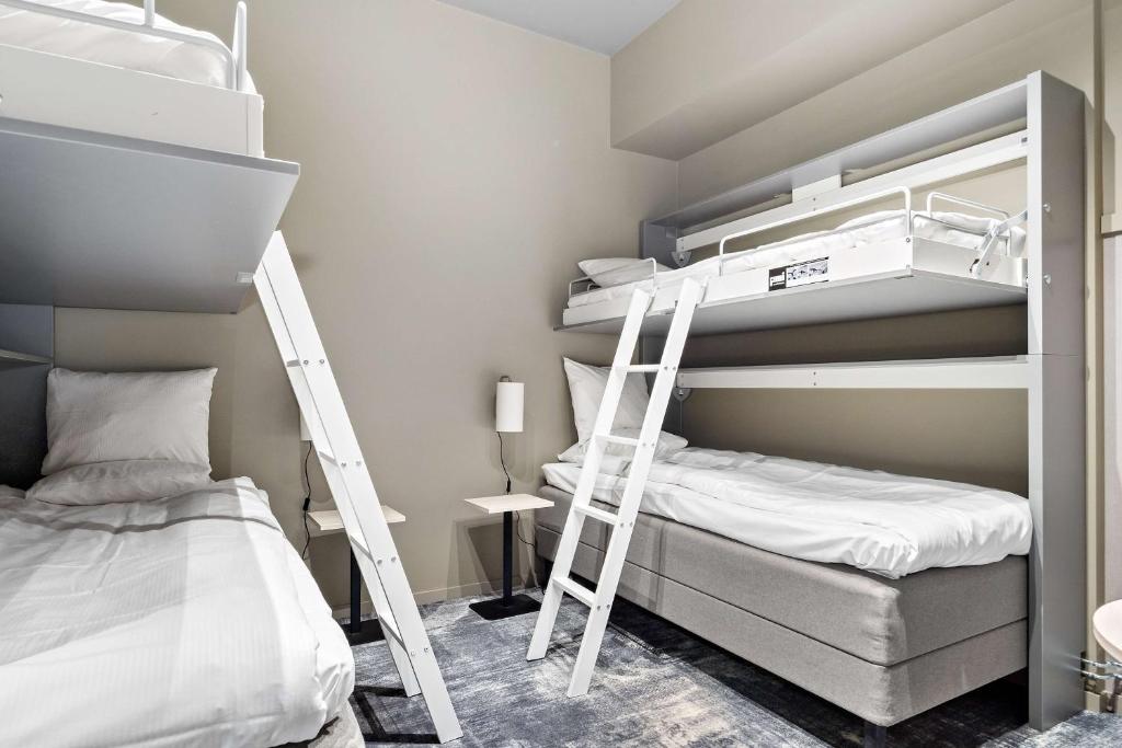 Postel nebo postele na pokoji v ubytování Aiden by Best Western Karlstad Arena