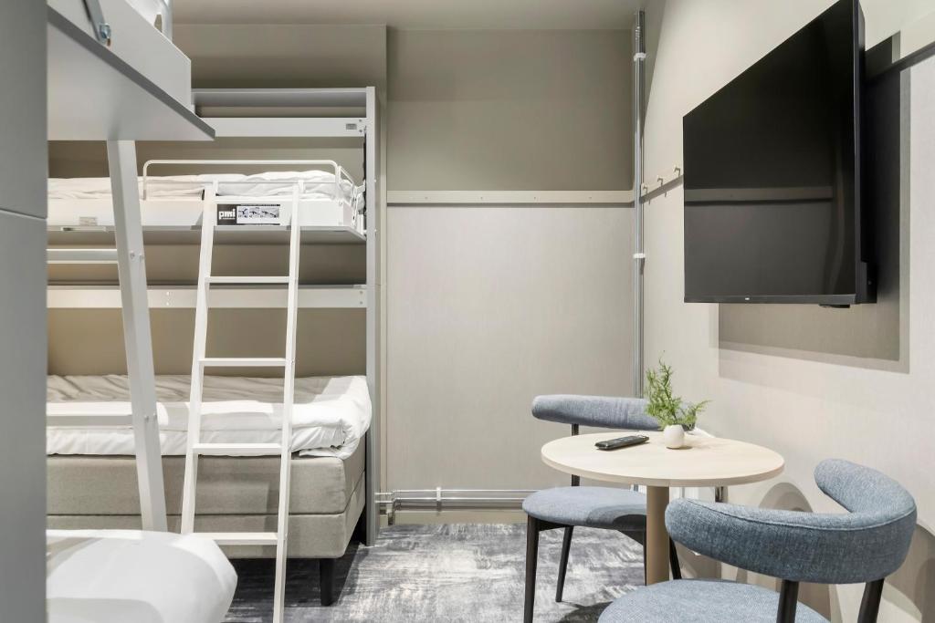 Postel nebo postele na pokoji v ubytování Aiden by Best Western Karlstad Arena