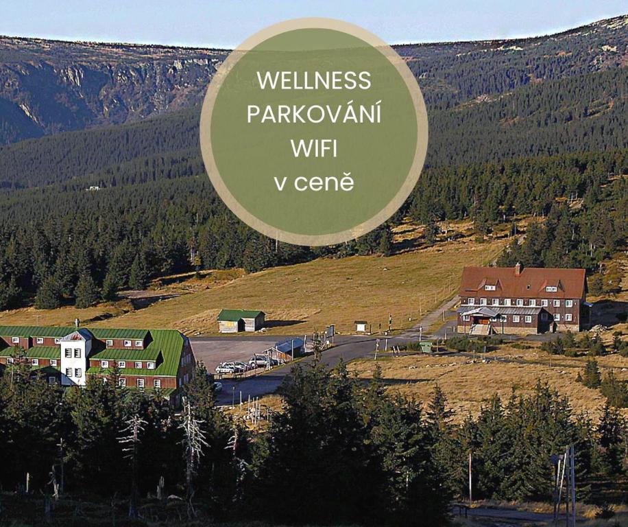 a sign that reads wilderness parkowment with v center at Hotel Spindlerova Bouda in Špindlerův Mlýn