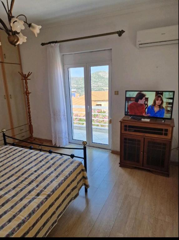 Postel nebo postele na pokoji v ubytování Chrysafos view