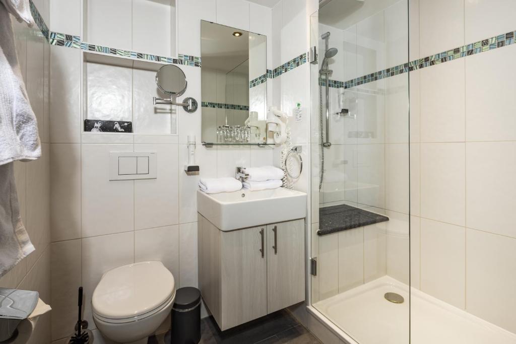 Koupelna v ubytování Hotel Gruenberger