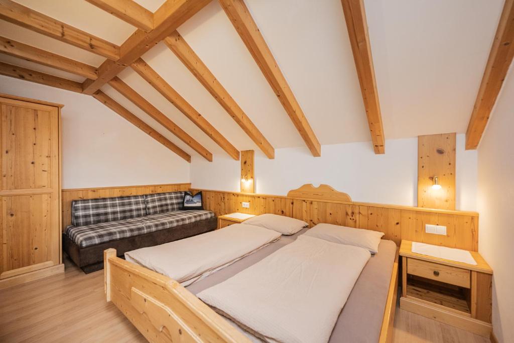 Postel nebo postele na pokoji v ubytování Klaudehof