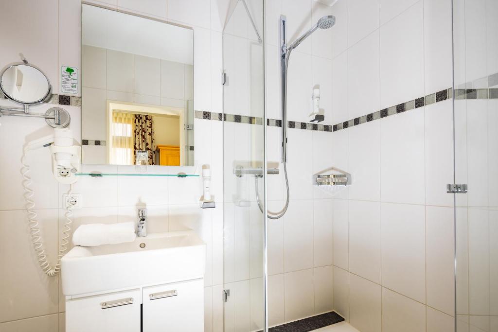 Koupelna v ubytování Hotel Gruenberger