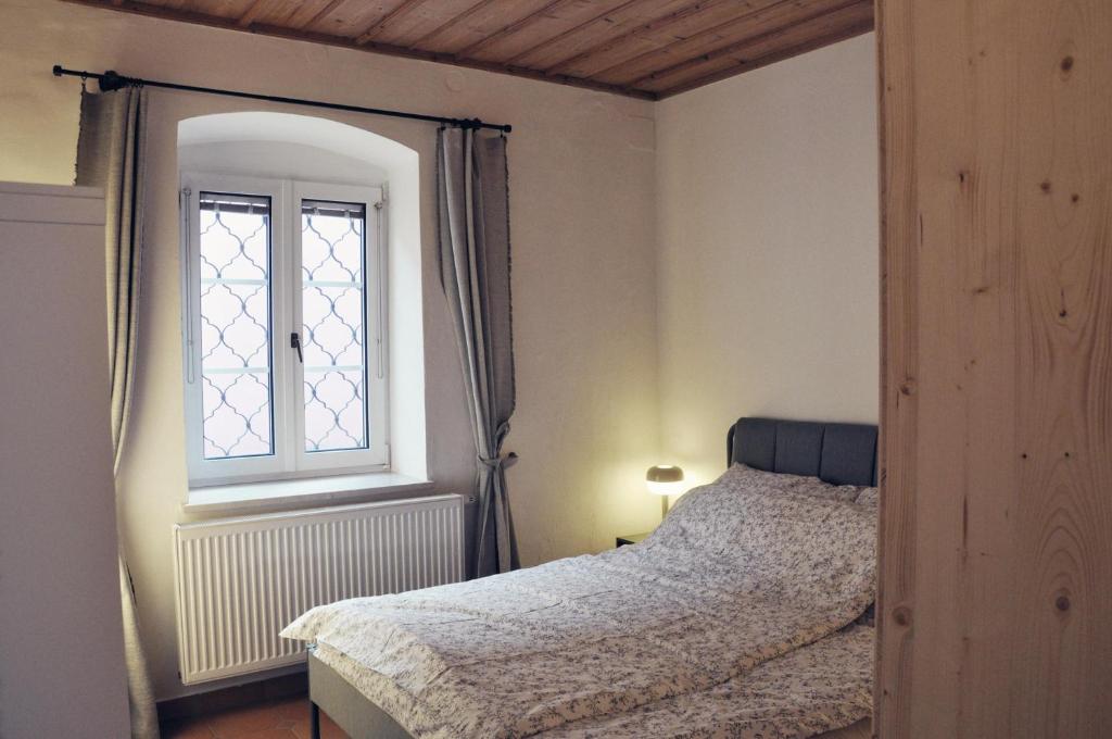 Postel nebo postele na pokoji v ubytování Wohnen bei Schörgi