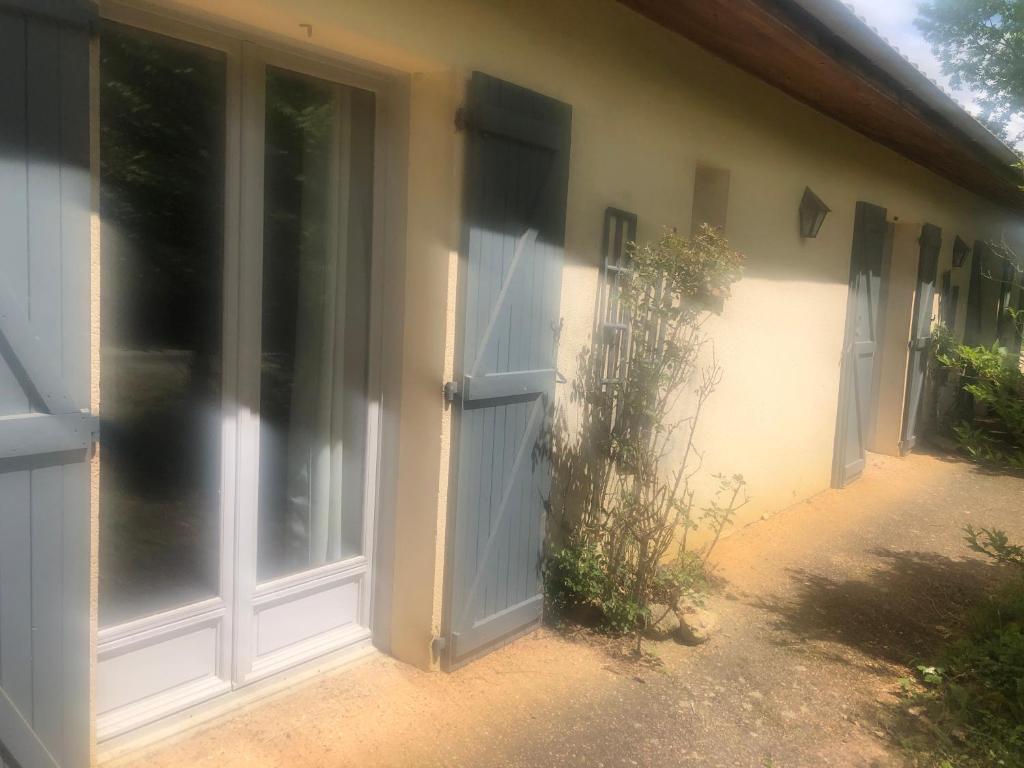 an entrance to a house with a door at Chambres d hôte simone in Idrac-Respailles