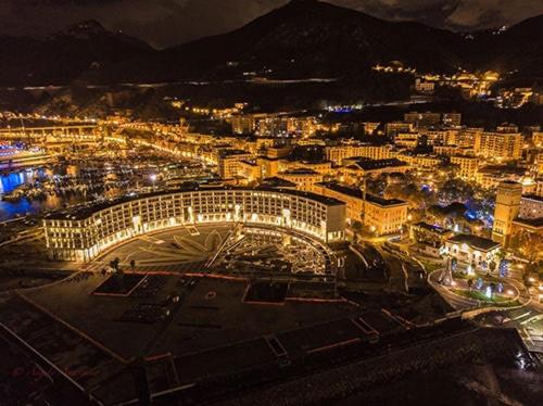 a view of a city at night with lights at CASA VACANZE - ANTICO CONVENTO in Salerno
