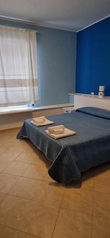Postel nebo postele na pokoji v ubytování B&B Casa Mia