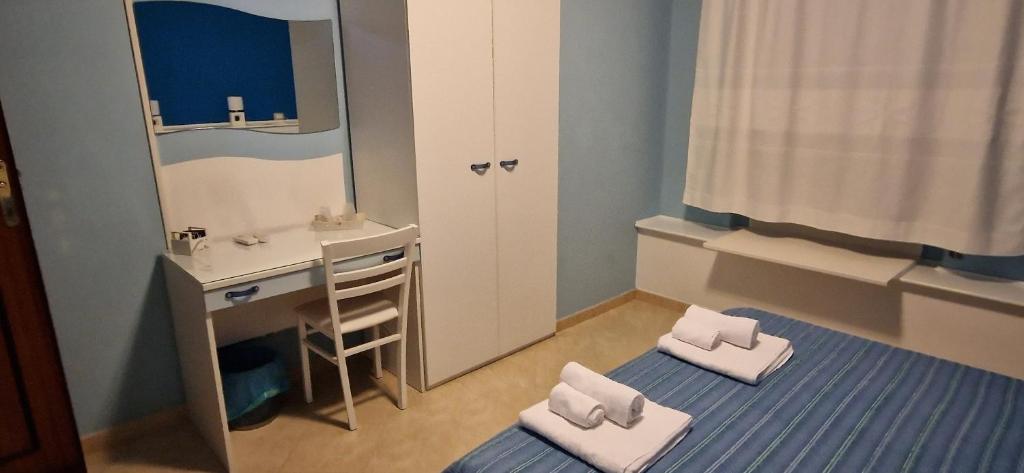 Postel nebo postele na pokoji v ubytování B&B Casa Mia