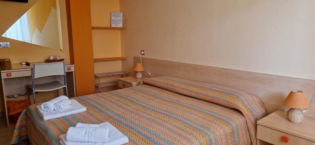 Postel nebo postele na pokoji v ubytování B&B Casa Mia